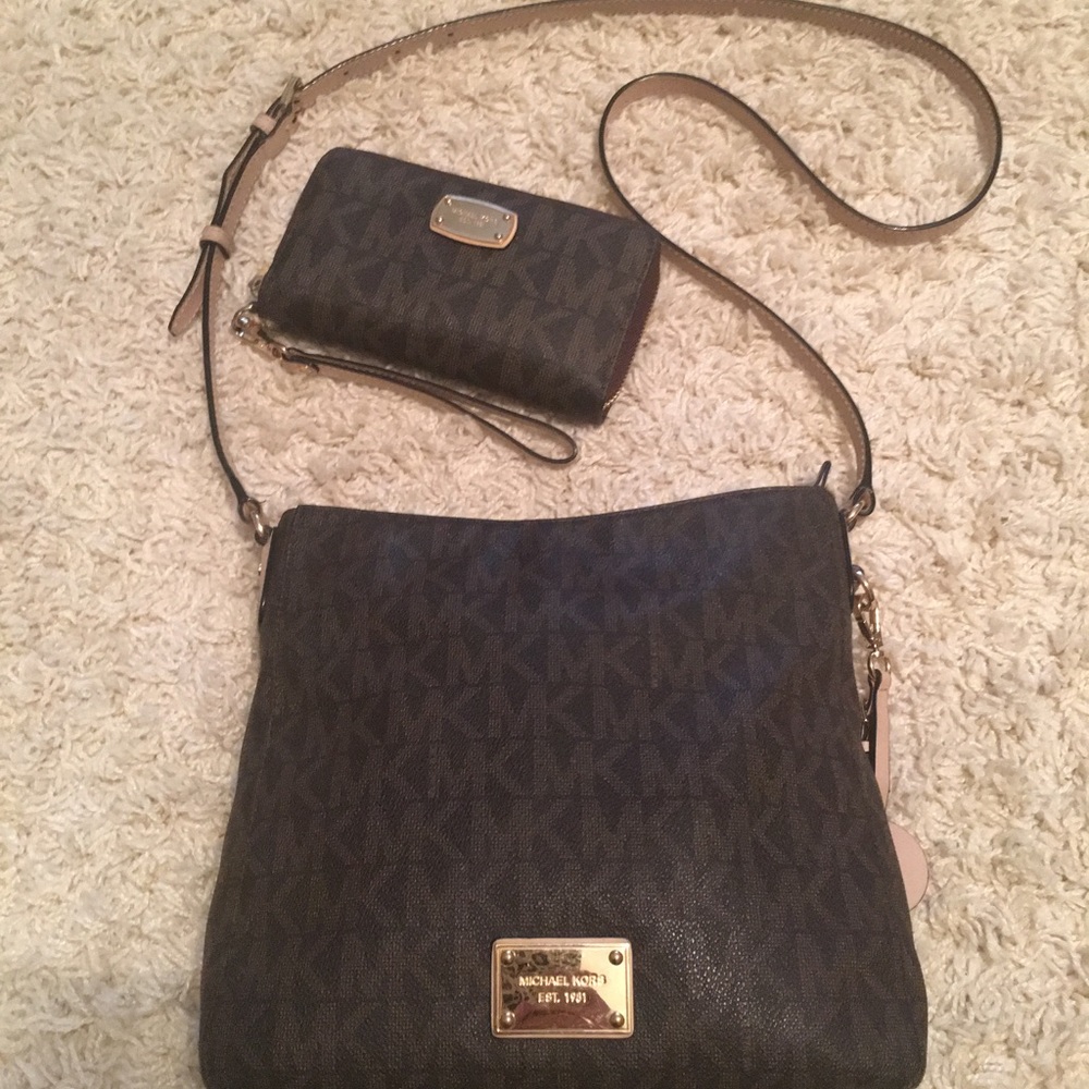Michael Kors purse with matching wallet/clutch.